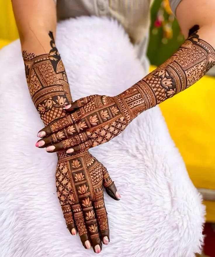 Floral mehandi on crossed hands, Hazaribagh