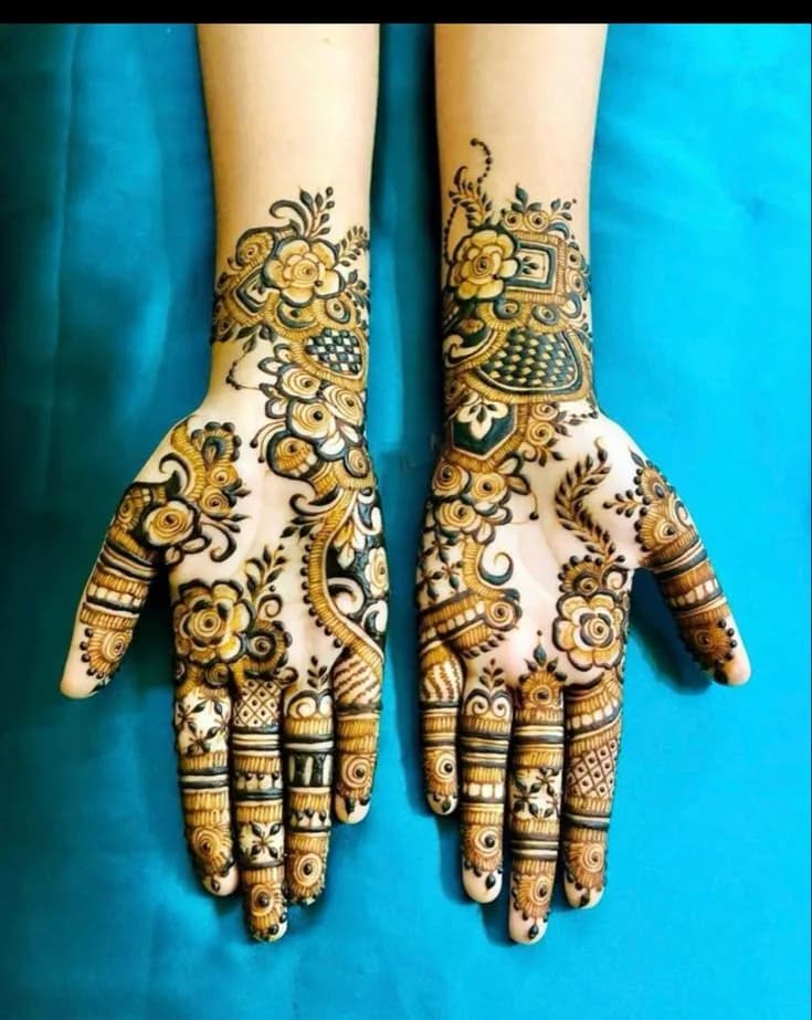 Rose and peacock mehandi on both palms