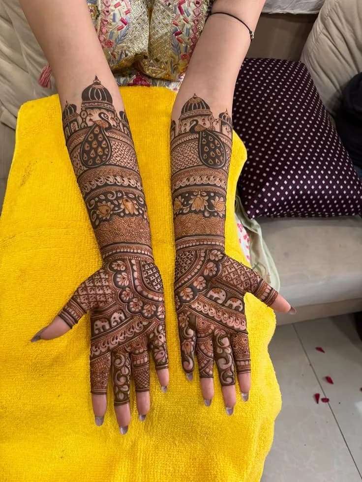 Bridal mehandi with temple dome and jharokha motifs