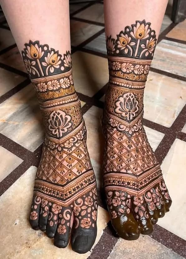 Lotus feet mehandi design with dark toes